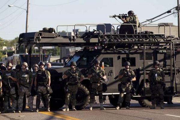 [Image: Tanks-and-SWAT-police-in-Ferguson-MO.jpg]